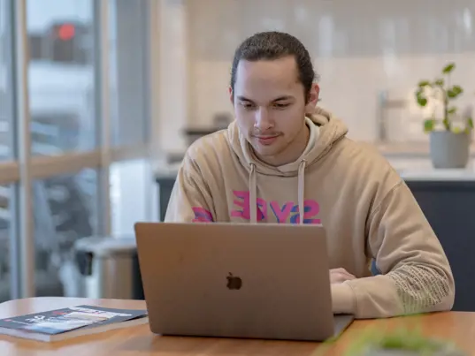 young man at laptop