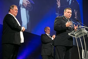Image of Brendan Nottle accepting award