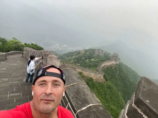 Casey walking the Great Wall of China