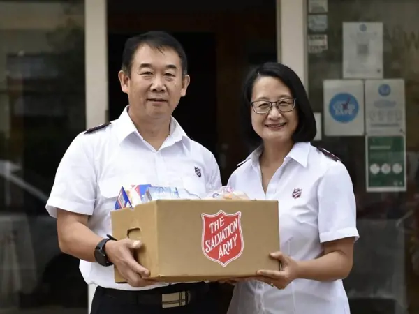 Frank and Belinda care for people at Christmas