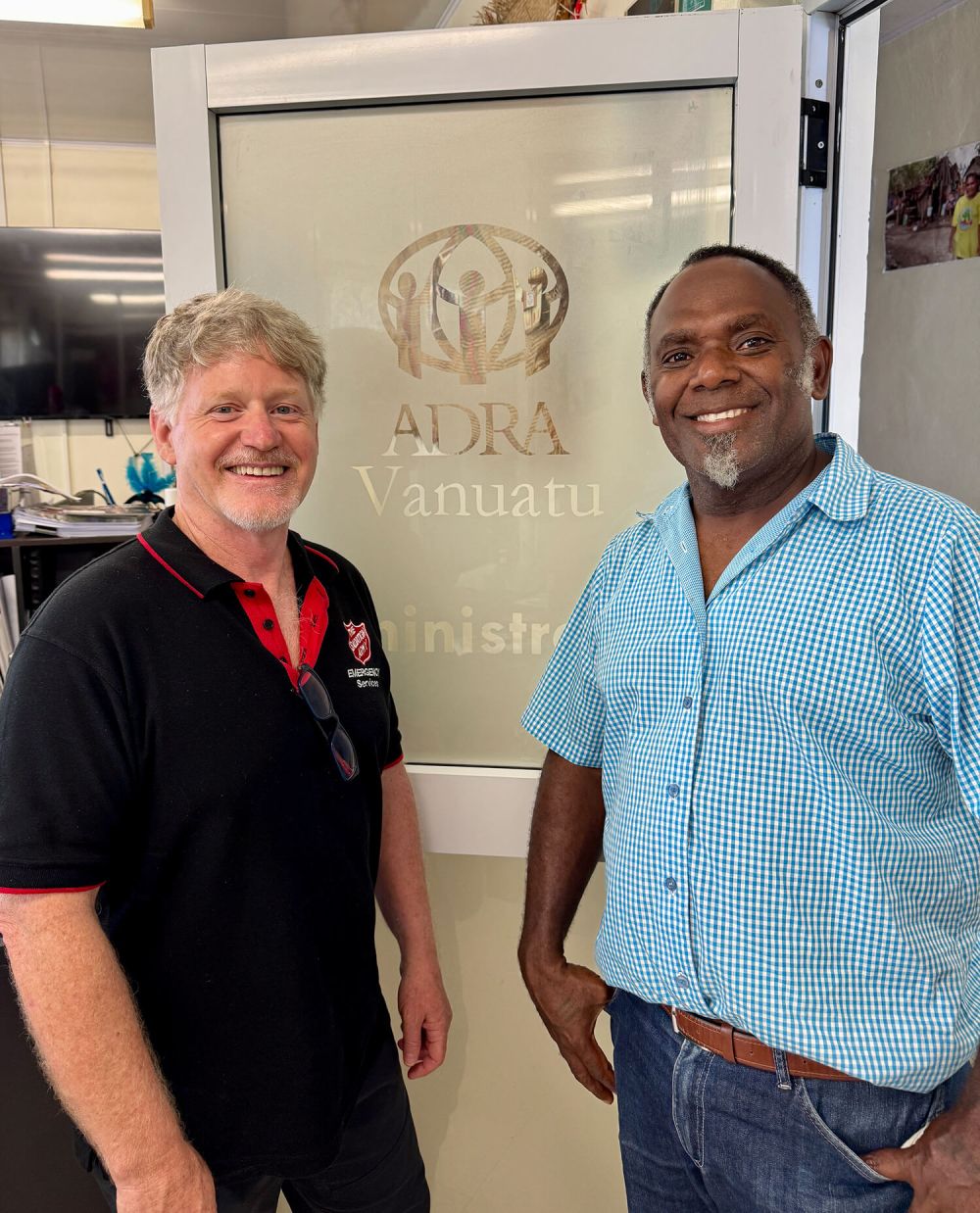 Daryl Crowden, General Manager SAES (left), and Pastor Thomas Belden of ADRA Vanuatu mark the beginning of a vital partnership with The Salvation Army Australia to deliver rainwater harvesting systems to five schools and five health facilities recovering from earthquake damage.