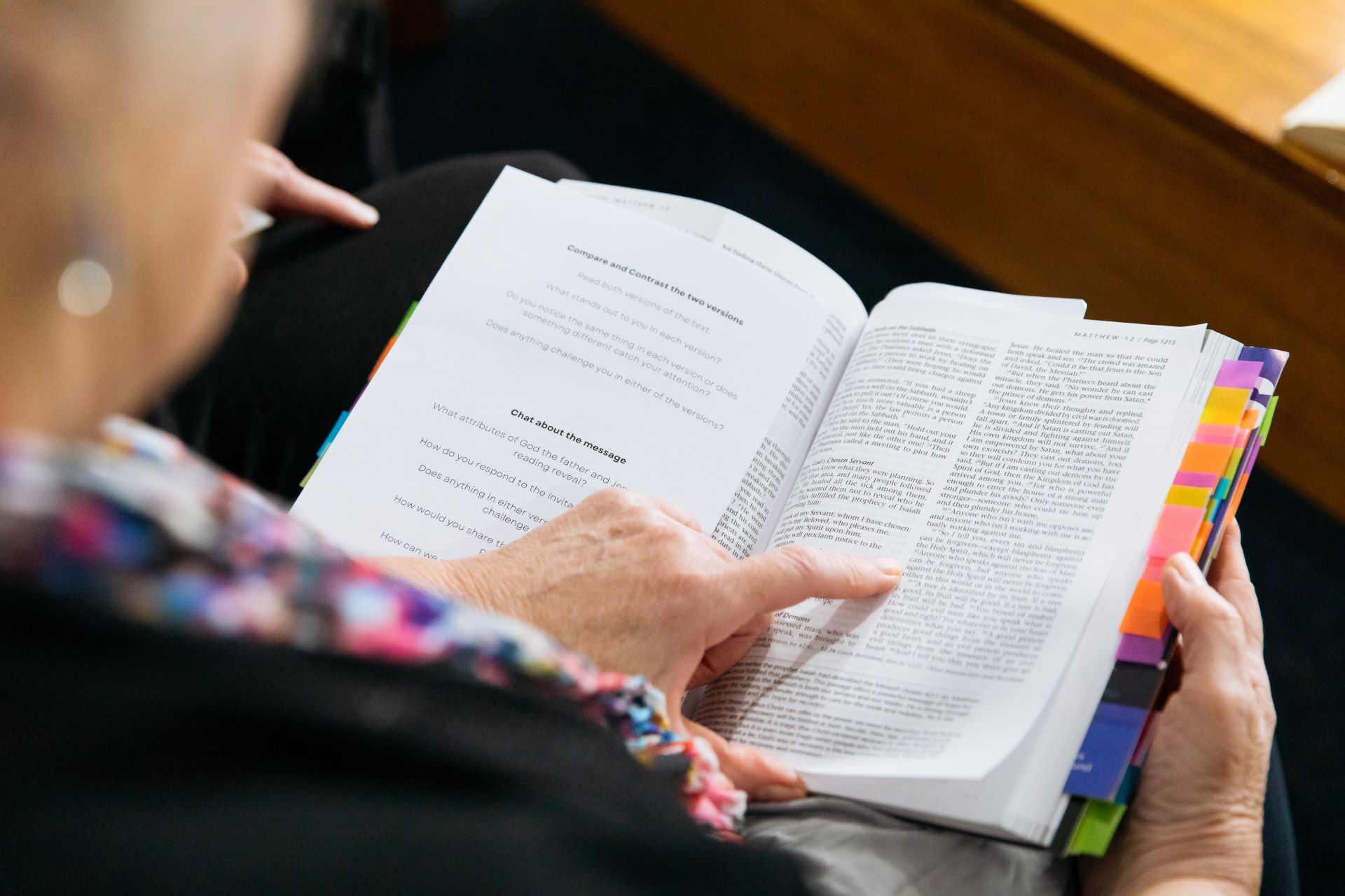 Close up of an individual reading a Bible.
