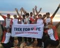 Group photo of Larapinta trekkers with Trek for Hope banner