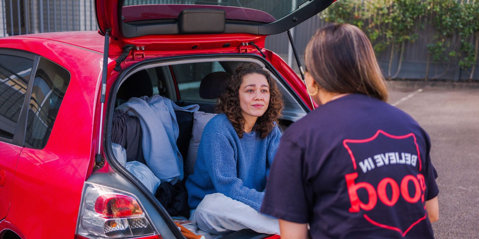 Salvos personnel helping a woman living in a car