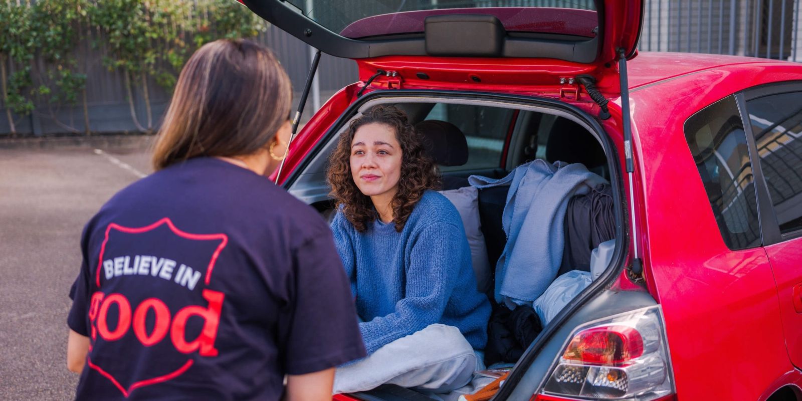 Salvos personnel helping a woman living in a car