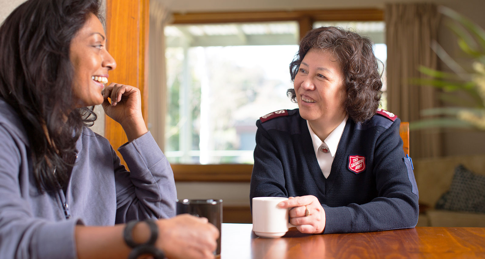 Salvation Army Officer listening to a client