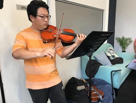 Man Playing Violin