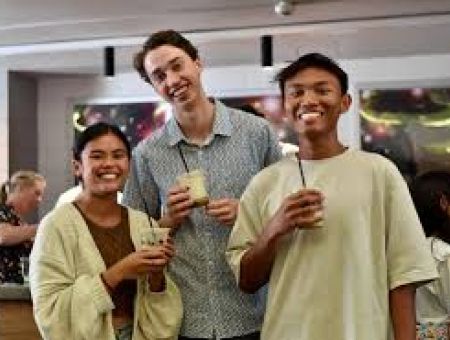 3 young people smiling together