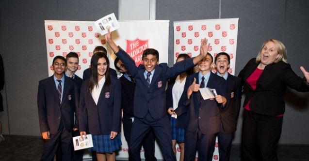 students-in-uniform-with-salvos-photobooth