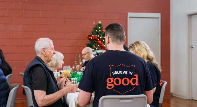 Salvos volunteer helping a person in need.