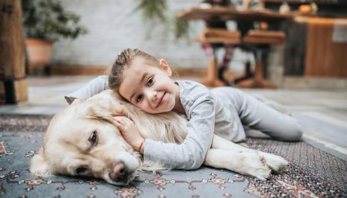 One man, his daughters and his dog