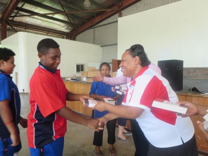 presenting dictionaries to girl