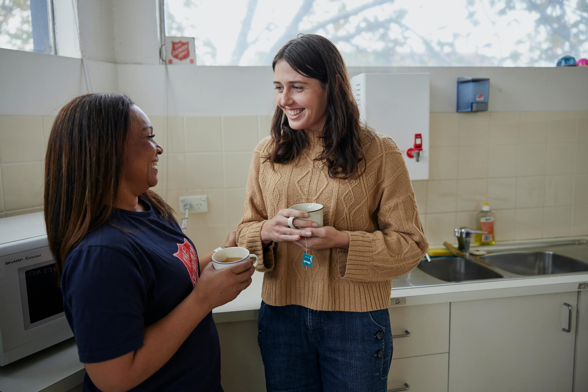 two women having a cup of tea