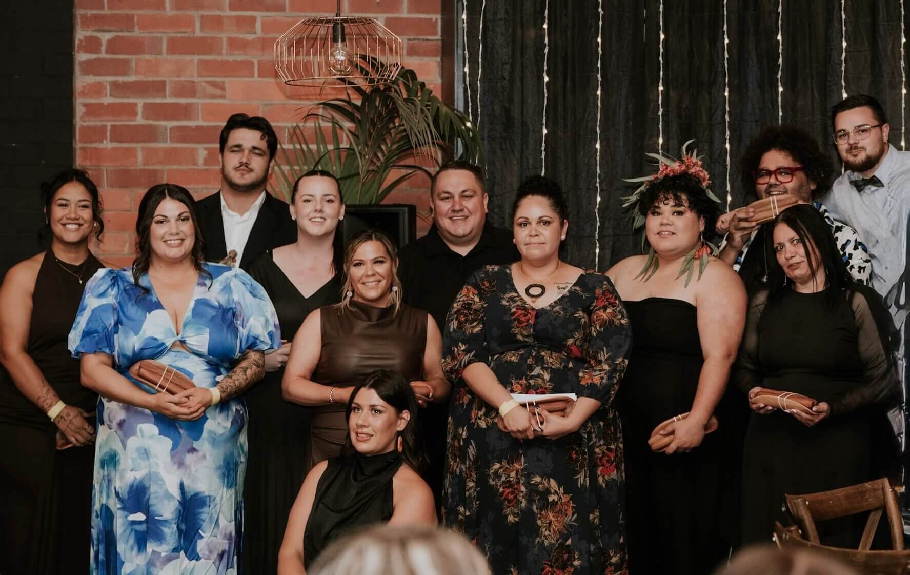 Allira (front, crouching) and the Swan Hill NAIDOC Committee celebrate young people in the community with a Youth NAIDOC Ball. 