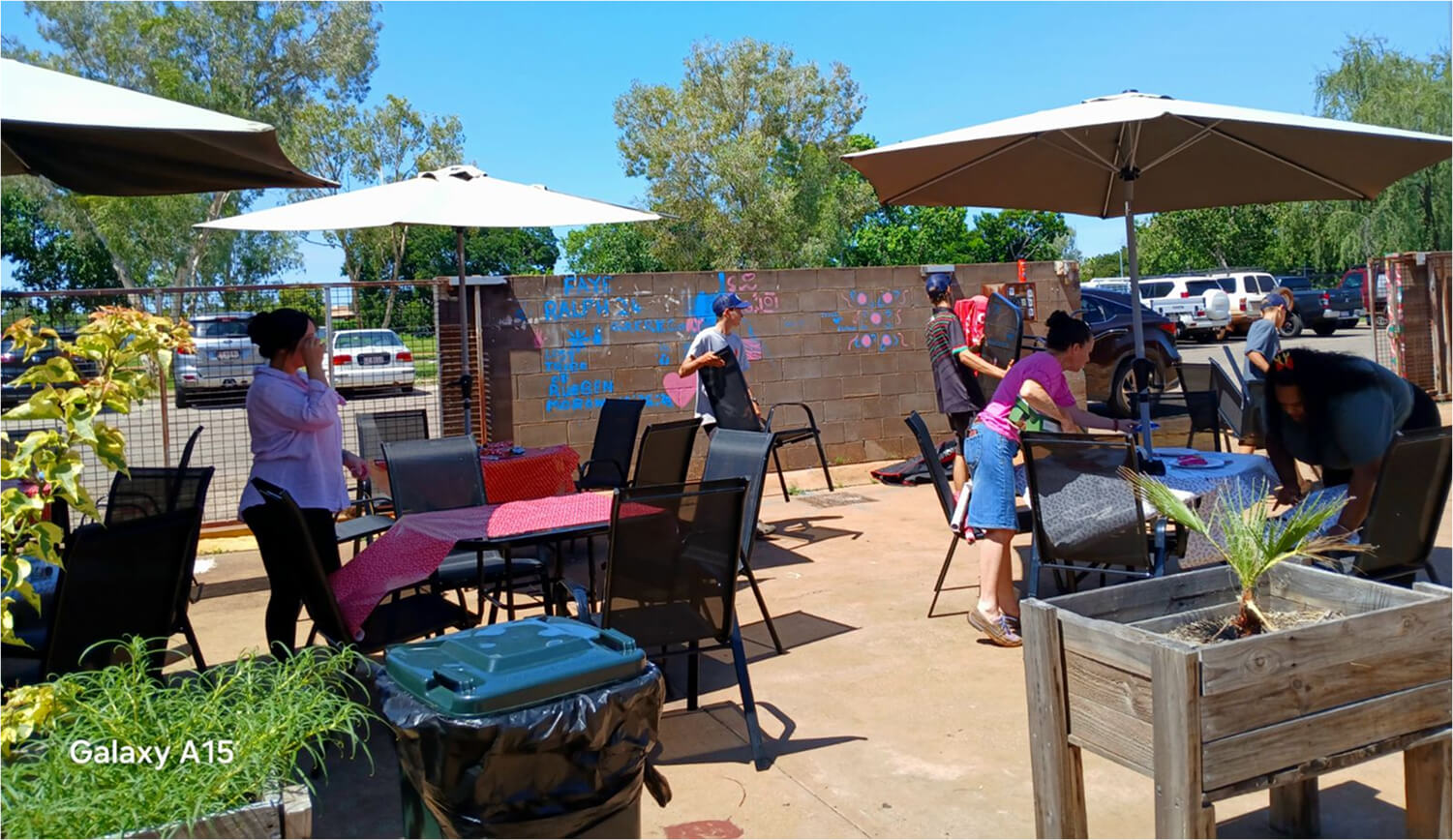 Christmas Day Katherine outside team of volunteers 2024