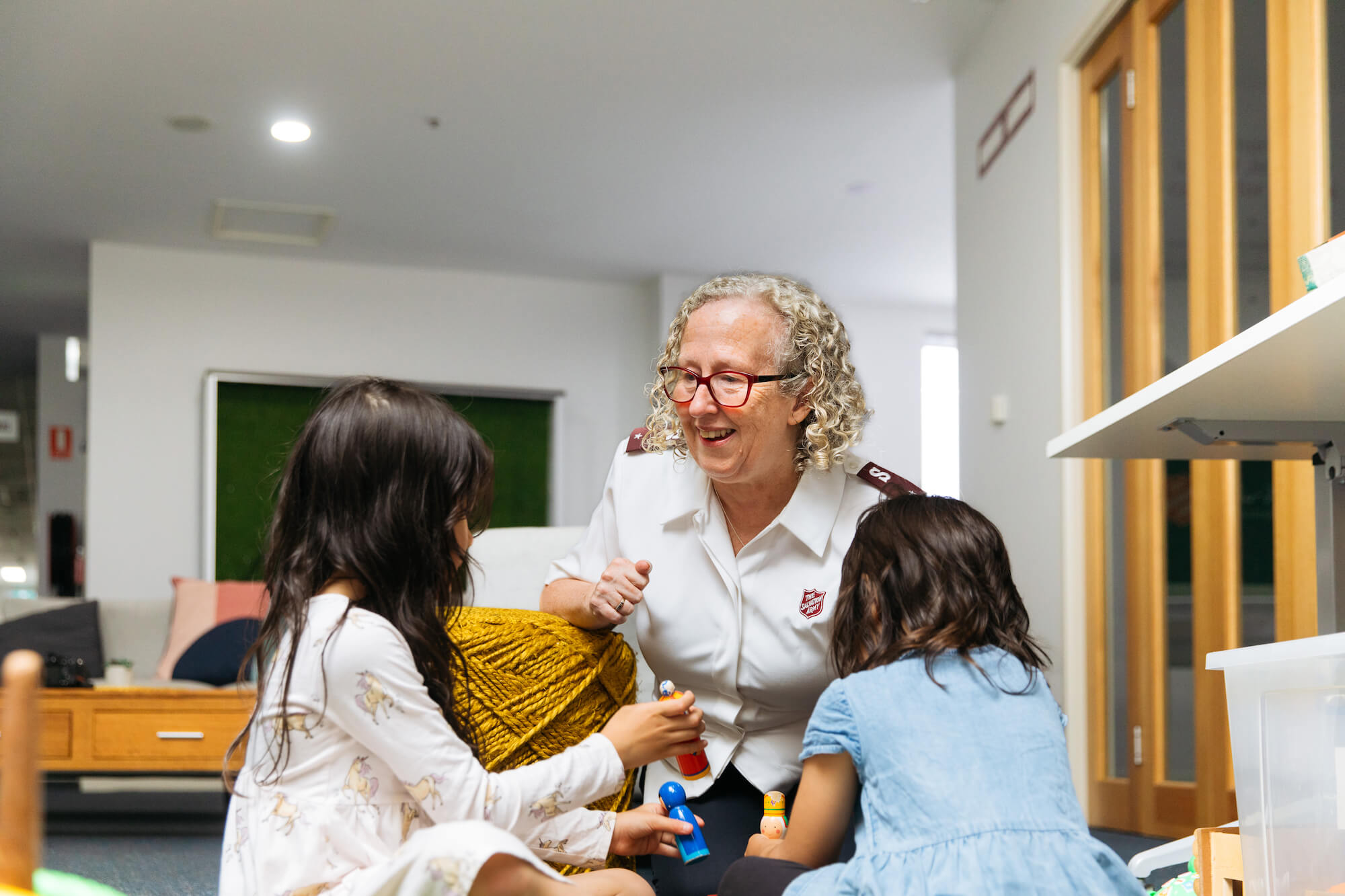 Salvos officer with children
