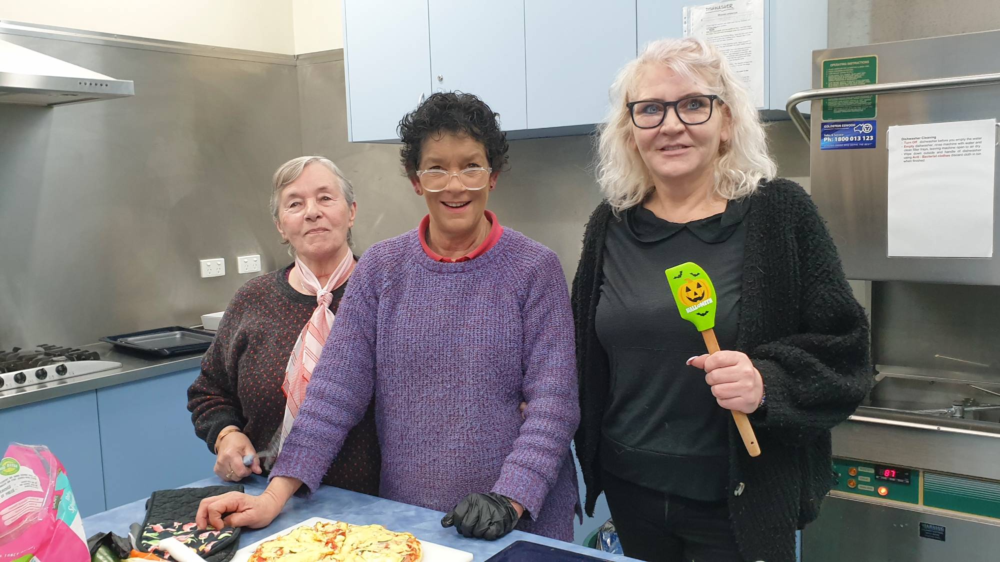Rose (centre) is passionate about caring for others at Preston Salvos drop-in.
