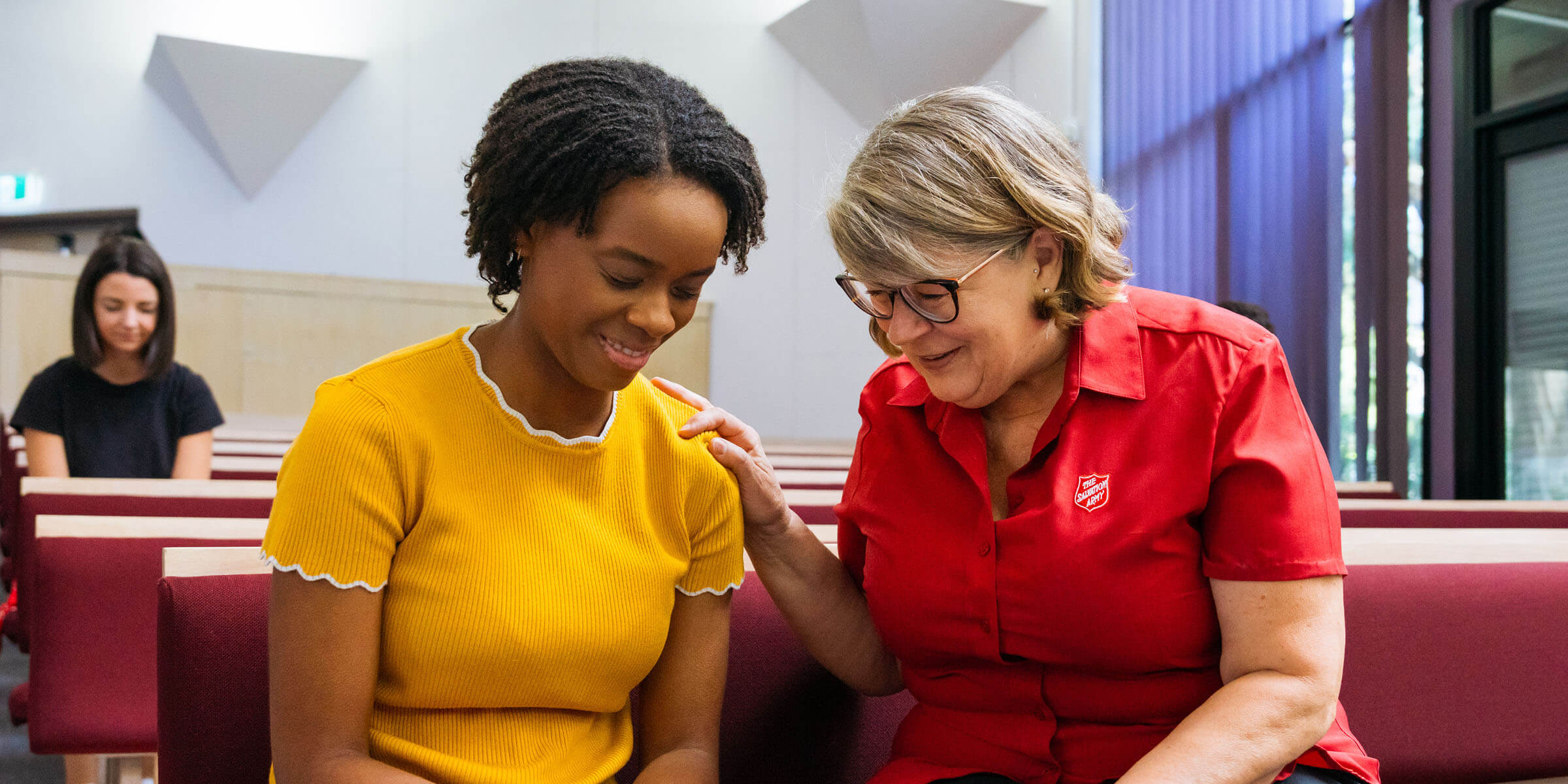Women praying together