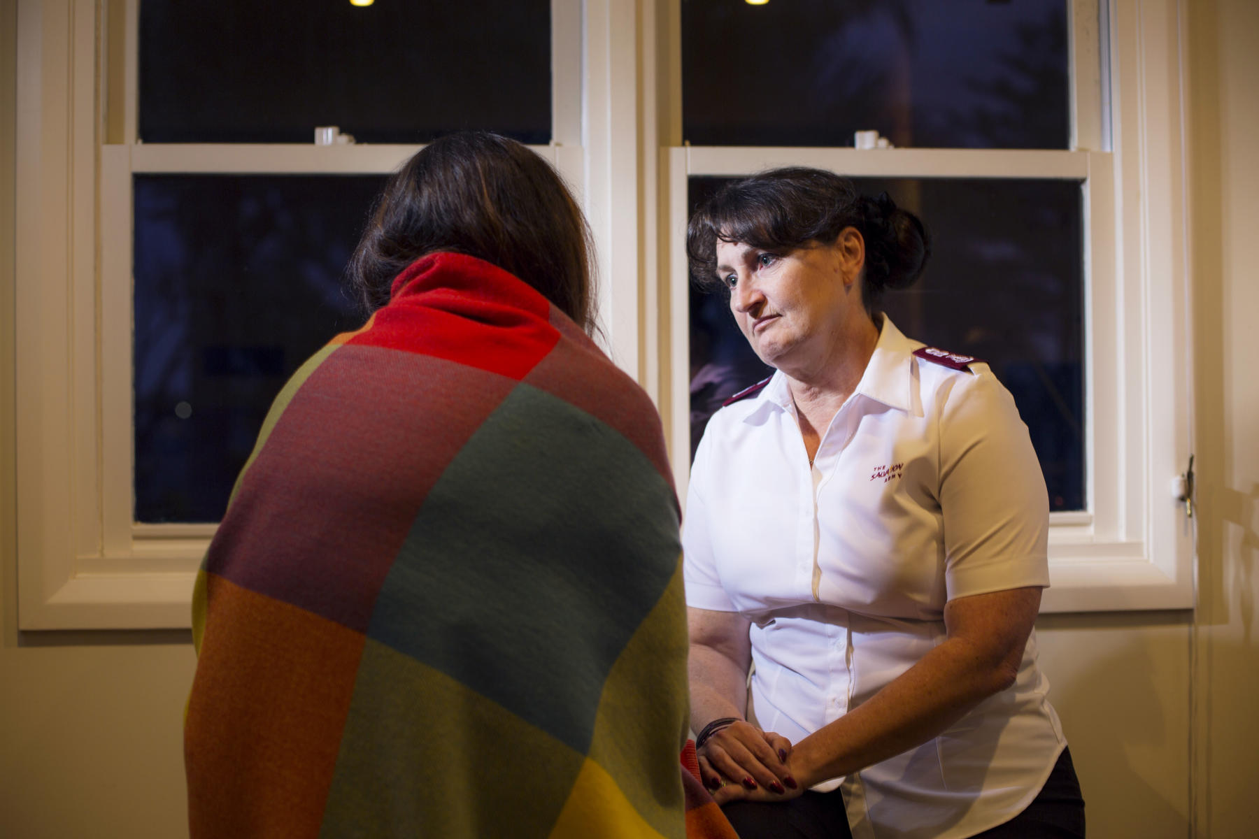 Salvos officer offering support to a domestic violence victim