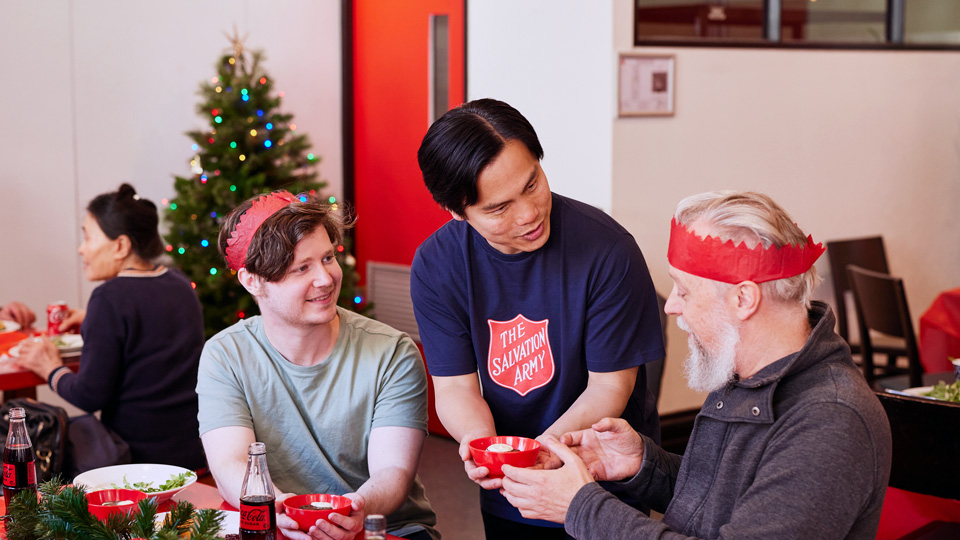 Salvos sharing a Christmas meal with the community
