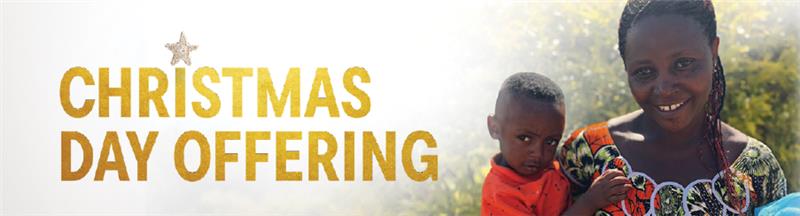 Image banner with text on the left side saying 'Christmas Day Offering' on the right side is an image of a woman holding her child.