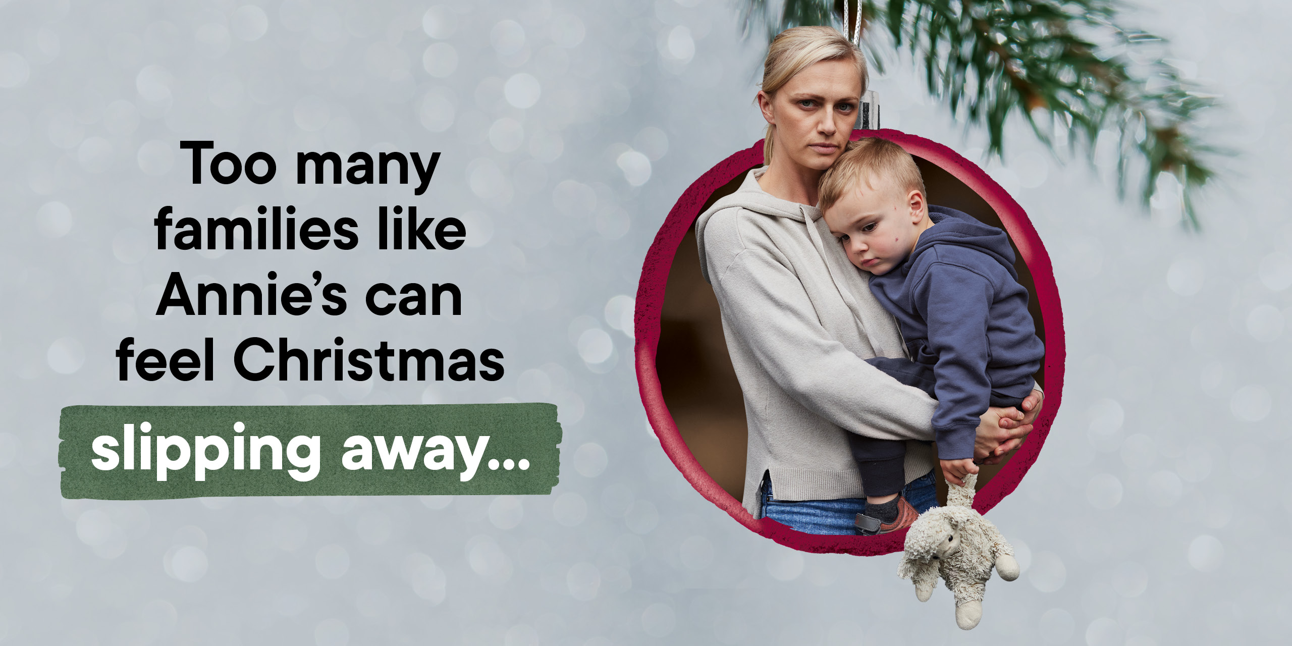 A mother holding her young son