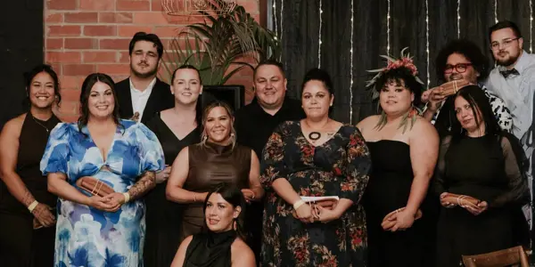 Allira (front, crouching) and the Swan Hill NAIDOC Committee celebrate young people in the community with a Youth NAIDOC Ball. 