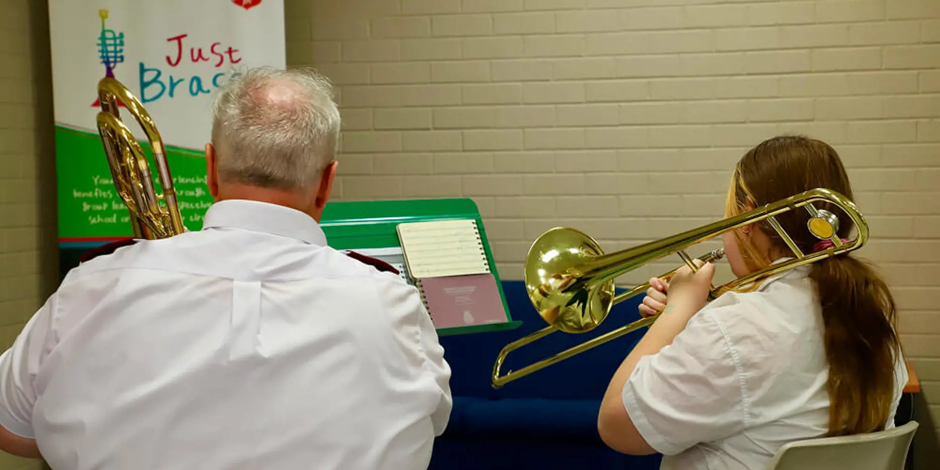The Salvation Army's Colin Young accompanies a Just Brass student