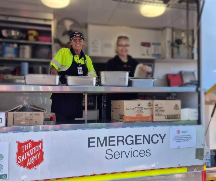 Leanne (left) volunteering with The Salvation Army Emergency Services.
