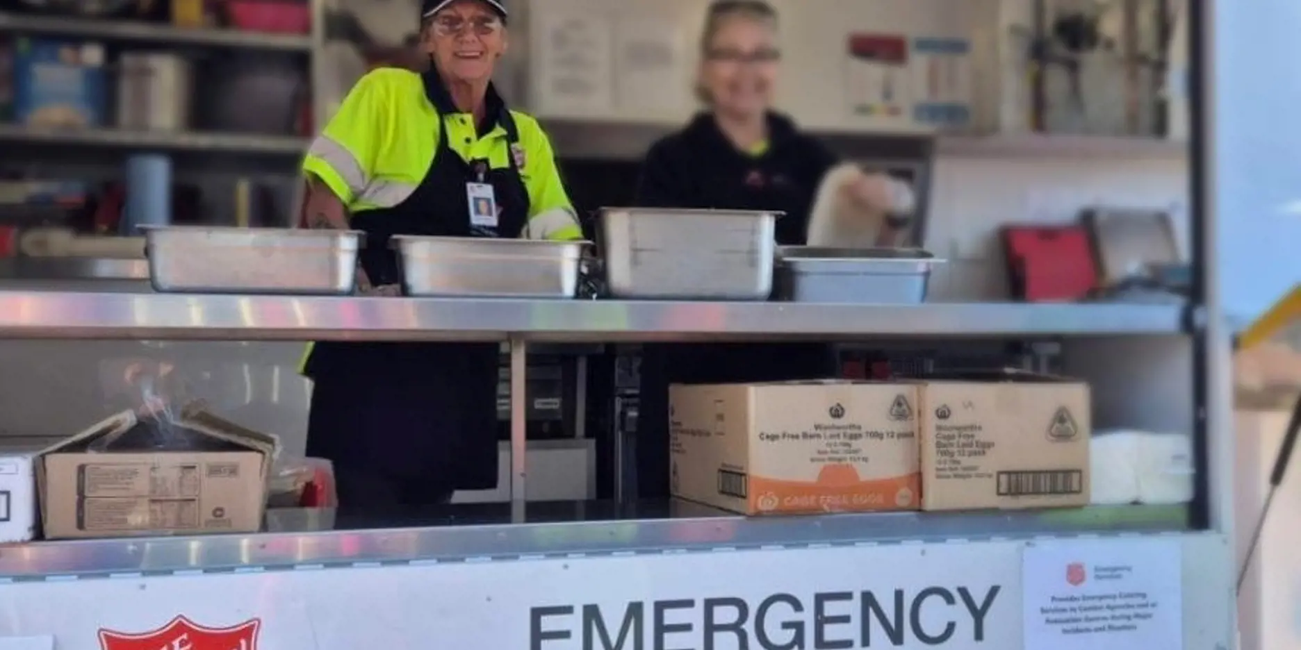 Leanne (left) volunteering with The Salvation Army Emergency Services.
