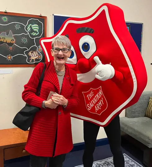 Moira at a Red Shield Appeal event — meeting Shieldy.