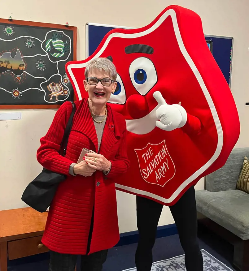 Moira at a Red Shield Appeal event — meeting Shieldy.