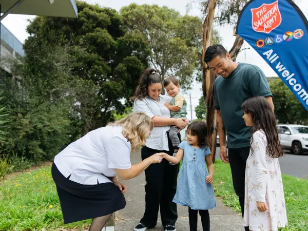 Hobart Corps officer talking to a family