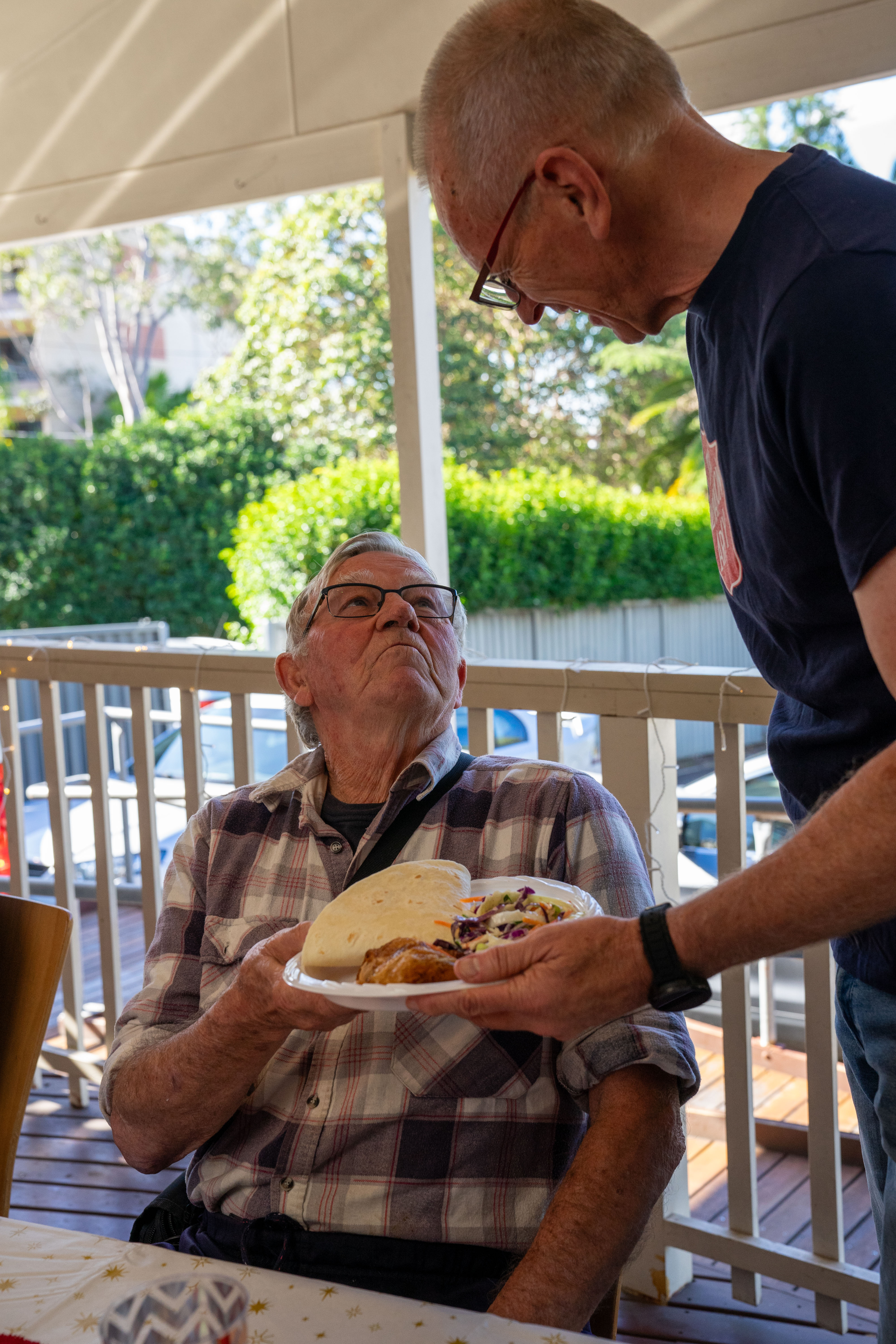 Man being served lunch