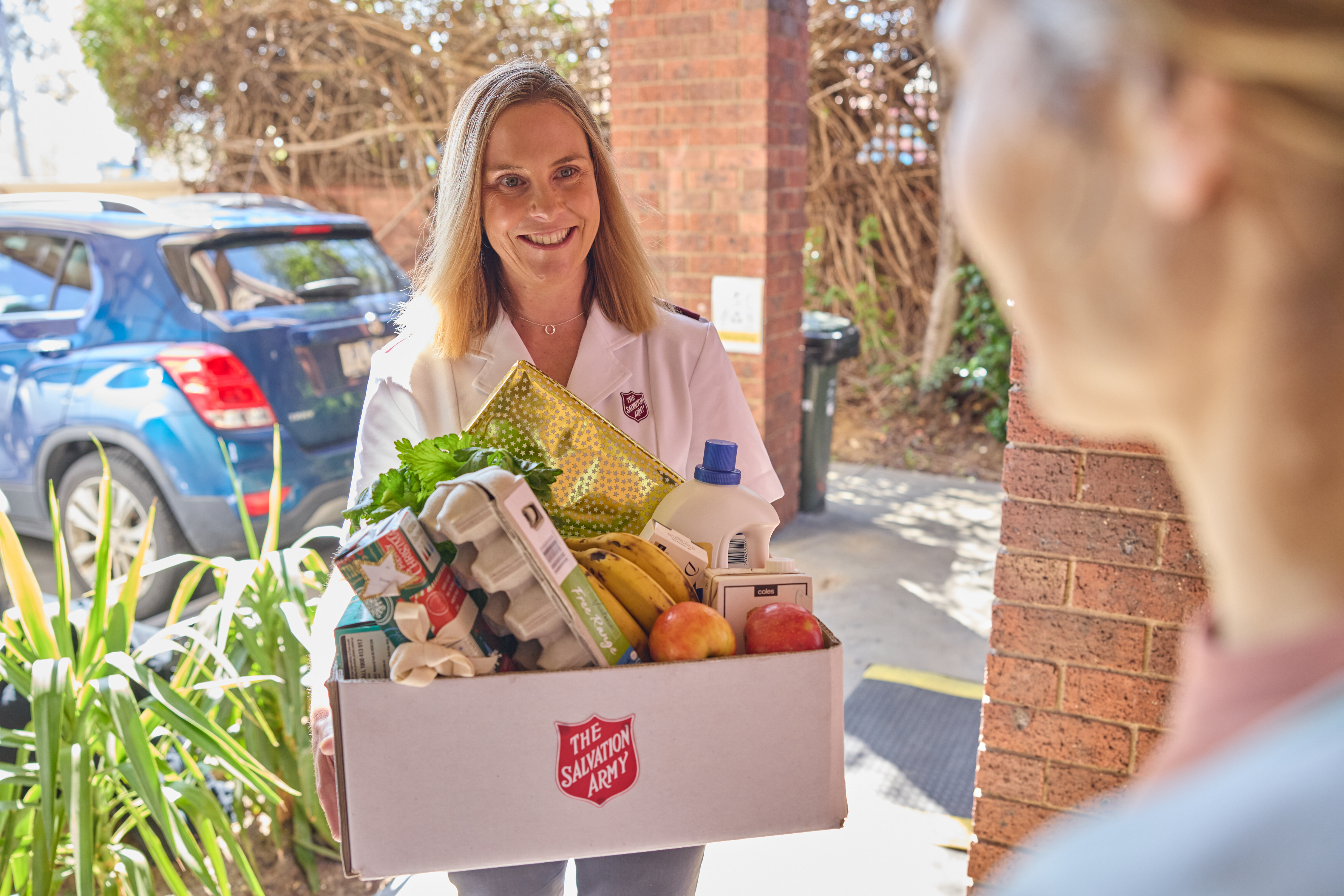 Officer delivering hamper
