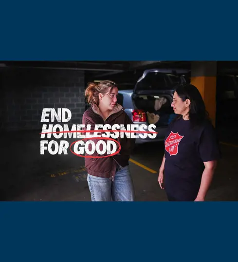 Homelessness Week 2026 image showing a Salvos volunteer assisting a woman in front of her car where she has been living out of.