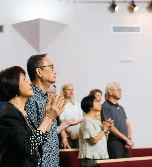 People in worship at a church