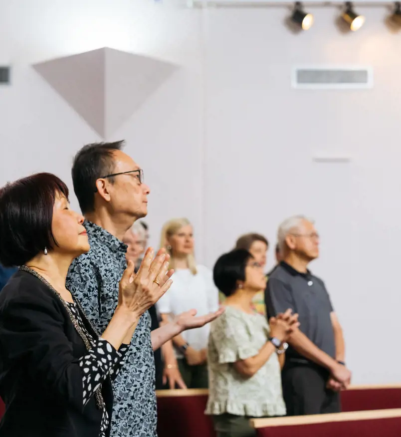People in worship at a church
