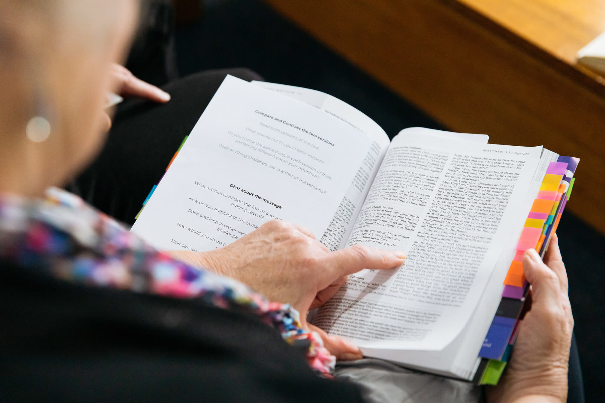 Elderly person reading bible