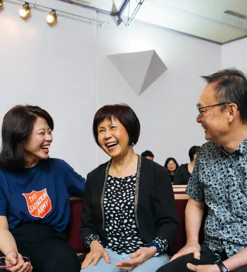 People enjoying fellowship at church service