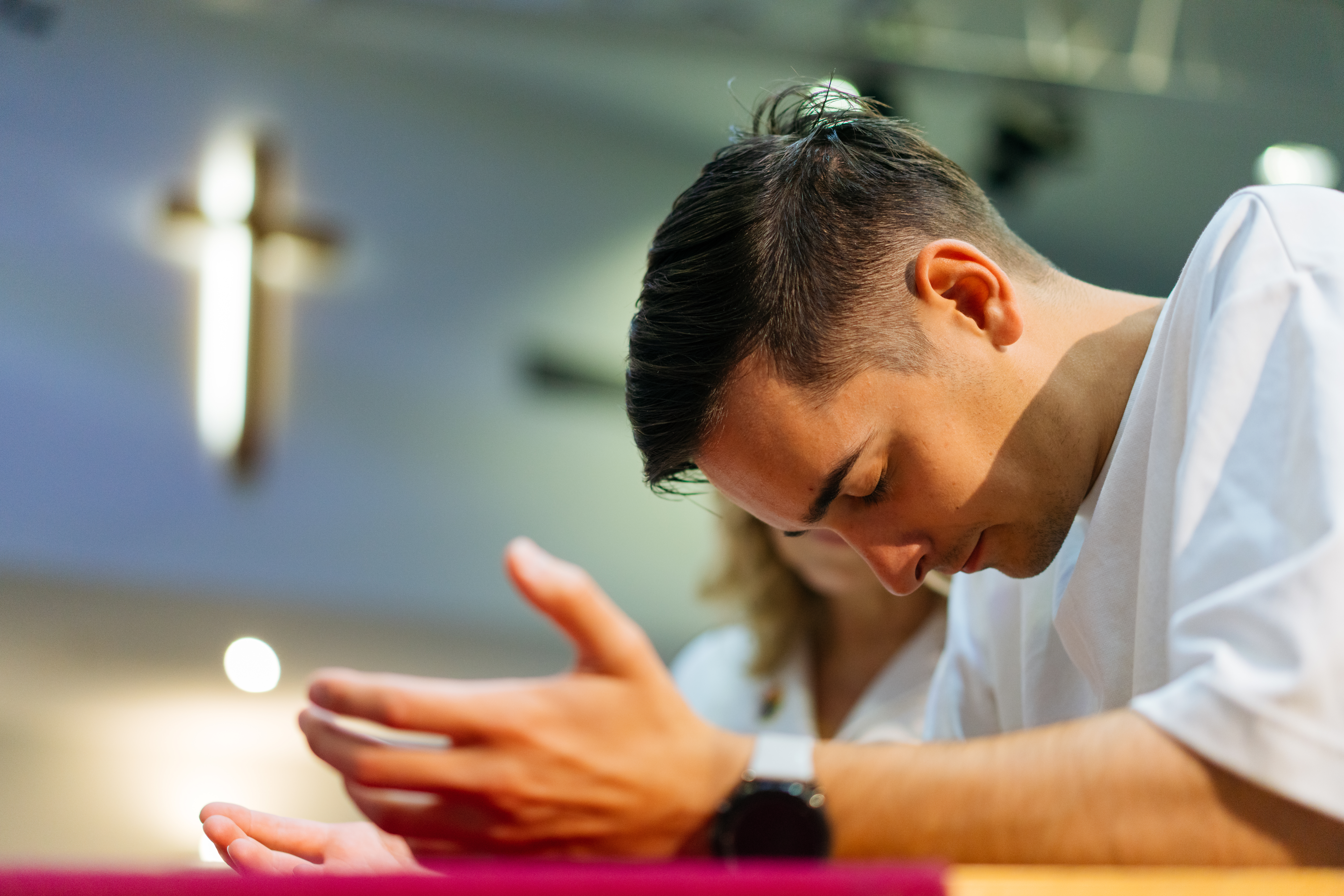 Young person worshipping solo