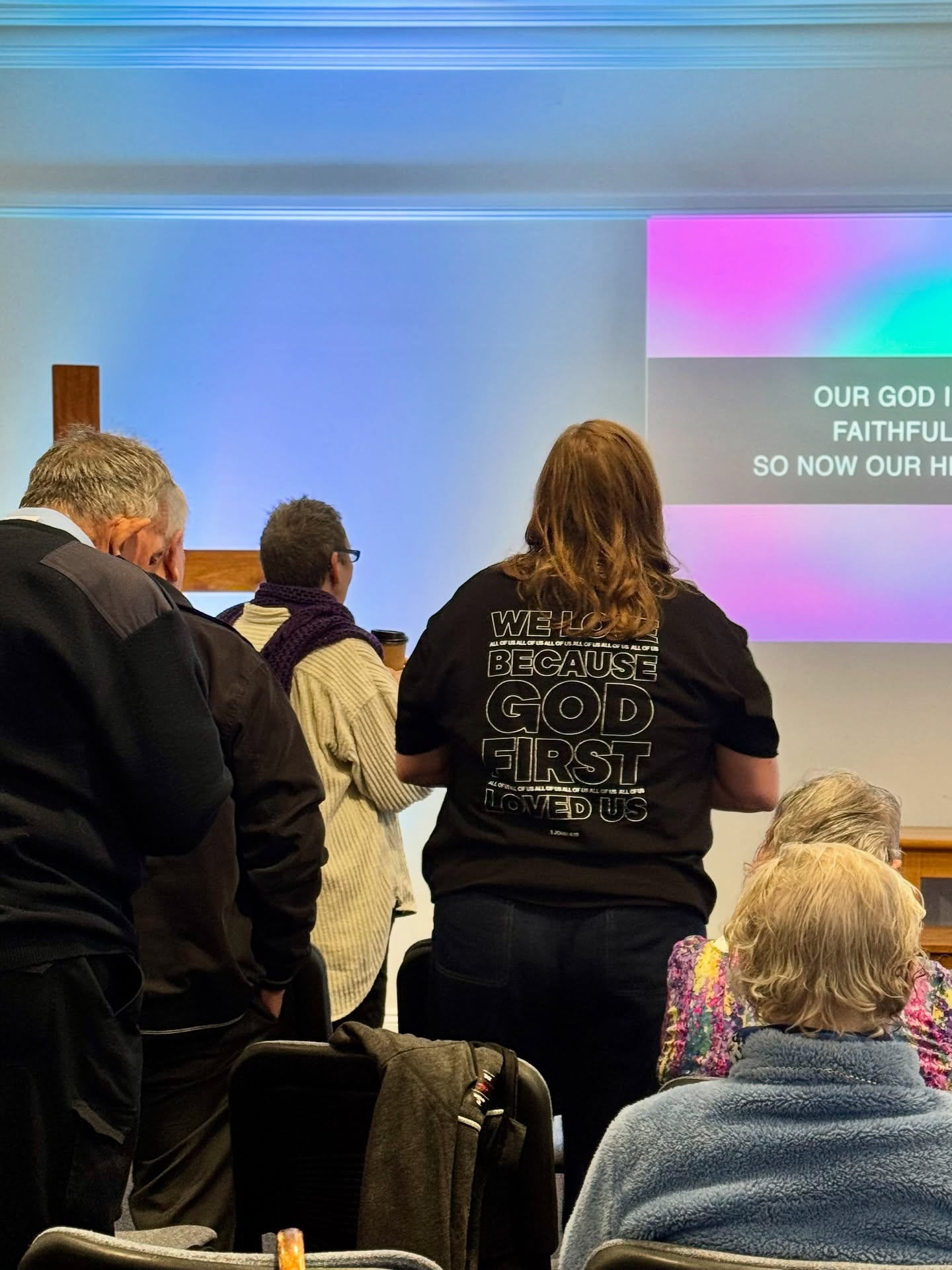 people praying during a service