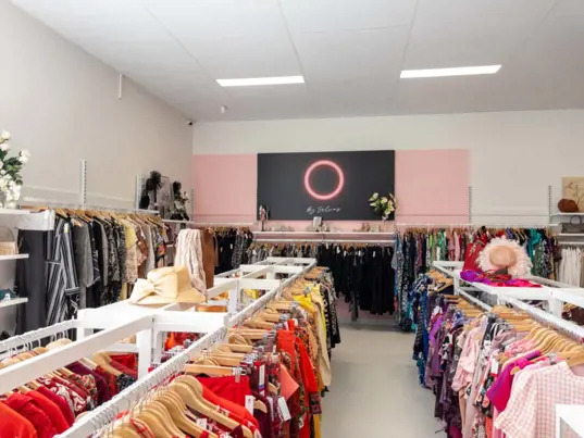 The Salvos Store at Moolap showing rows of clothes to buy.