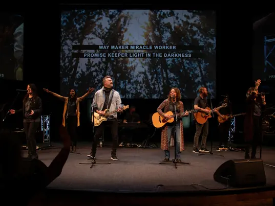 Image of a worship team on stage