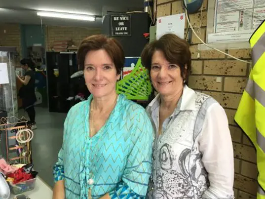 Family Store volunteers smiling