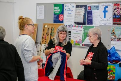 People shopping at the Golden Grove op shop.