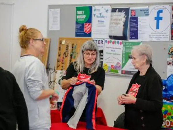 People shopping at the Golden Grove op shop.