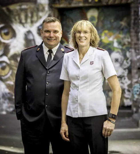 Major Brendan Nottle and his wife Sandra posing outside Melbourne 614