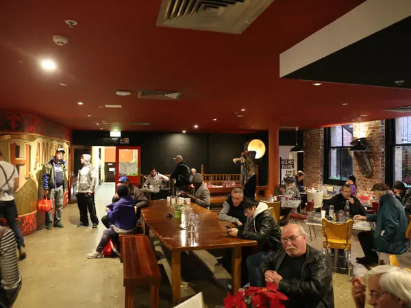People sitting in the main cafe area