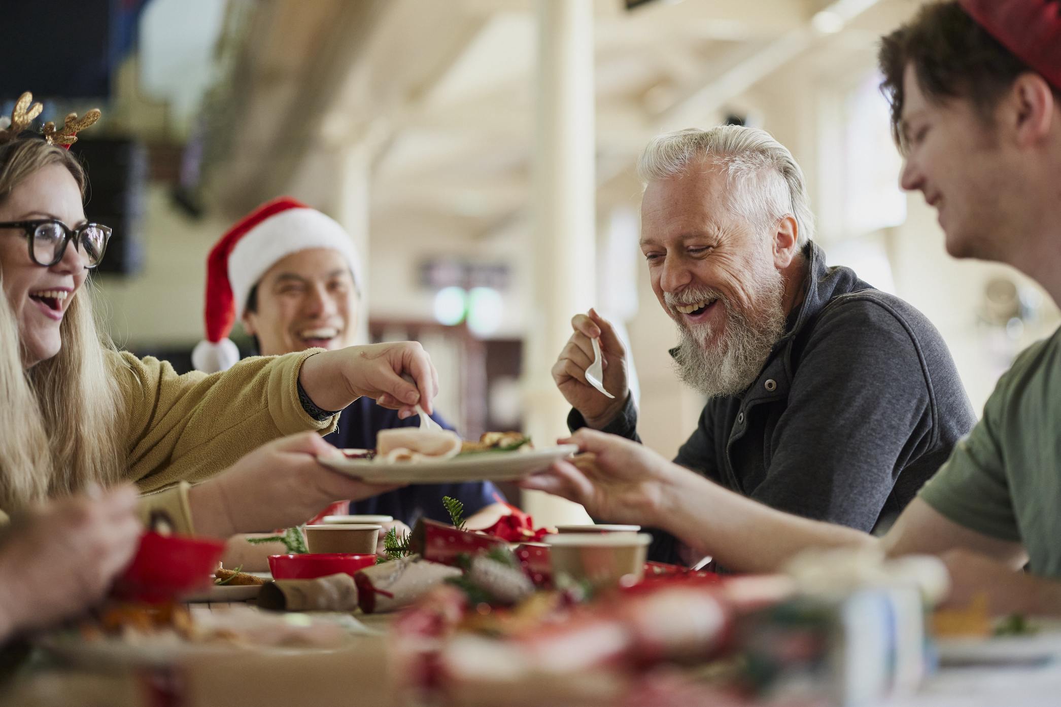 friends sharing a Christmas meal